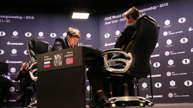 Carlsen Escapes, Draws Karjakin In Game 9