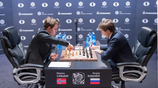 Carlsen Wins Marathon Game To Even Match With Karjakin
