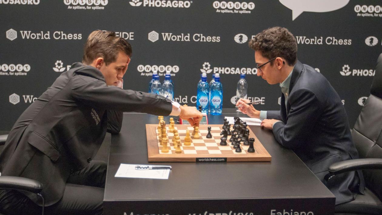 World chess championship: Carlsen defeats Caruana