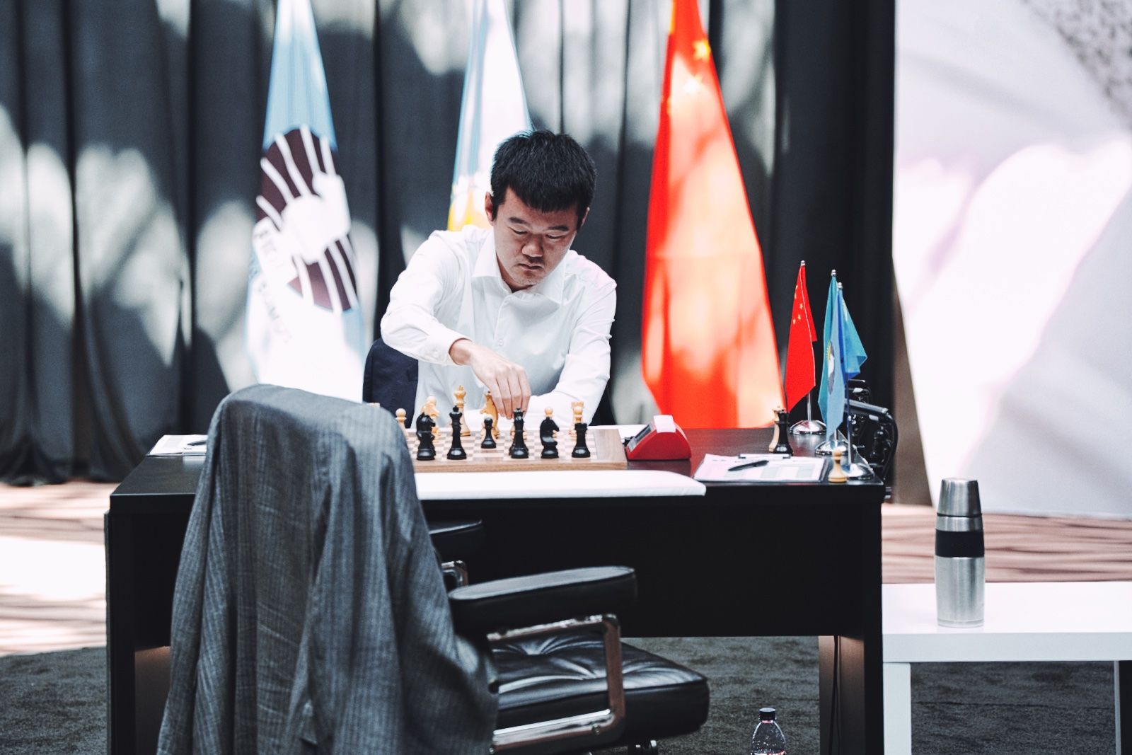 Ding Liren wins wild Game 12 to level the scores again