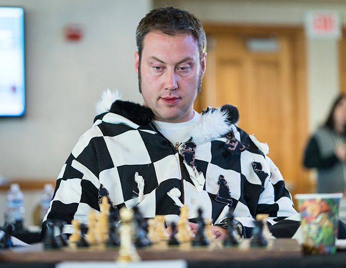Grandmaster plays 48 games at once, blindfolded while riding exercise bike, Chess