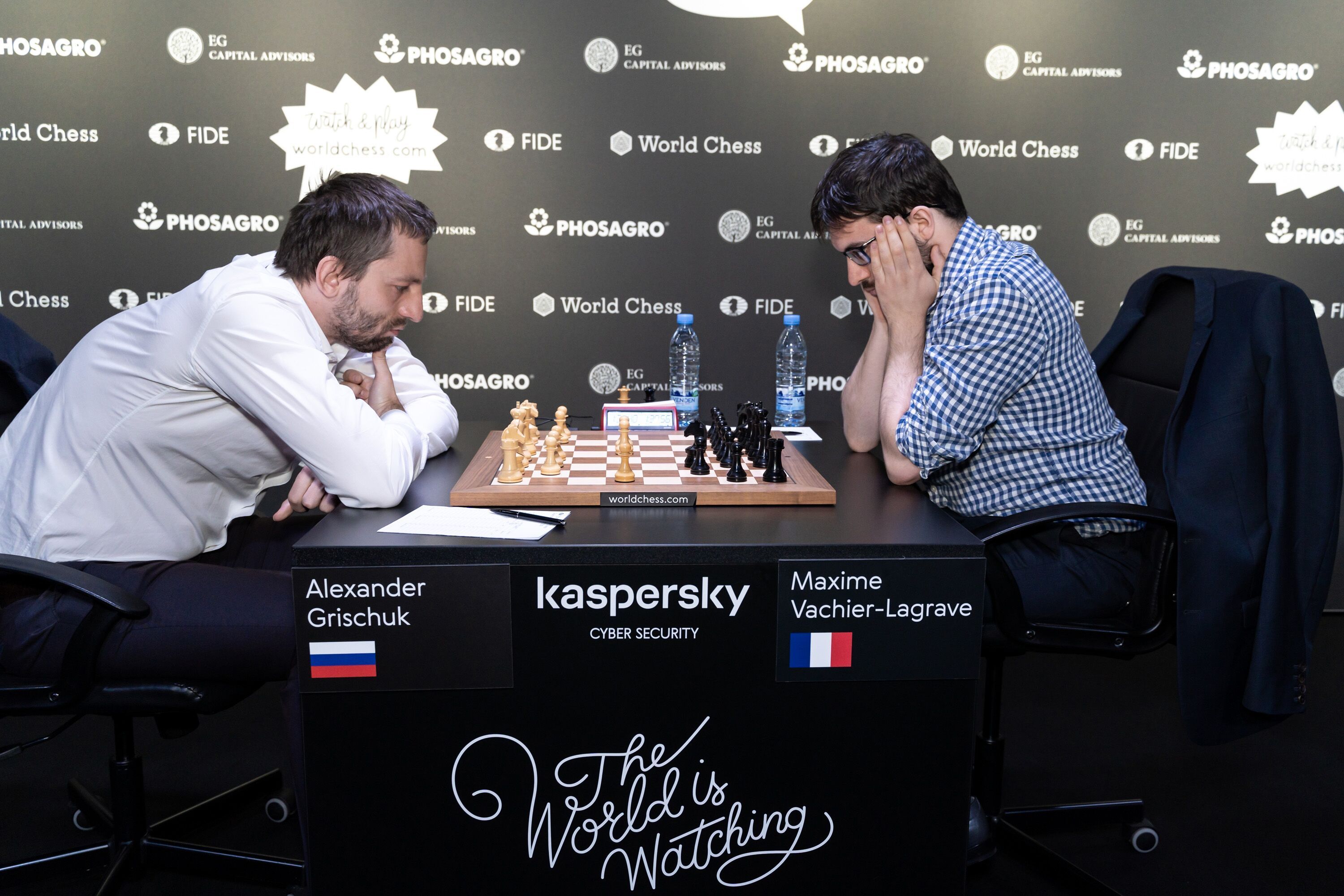 Grishuk vs Mvl 3) with h4 on board.  ,  Photo: Niki Riga/World Chess
