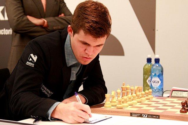 Carlsen Beats Adams, Leads Grenke After Round 2