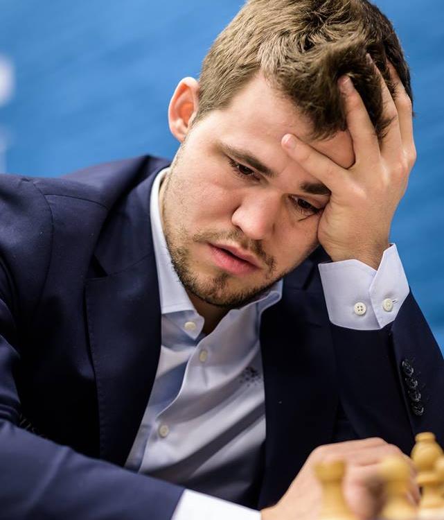 Hou's Blunder Helps Carlsen Increase Tata Lead