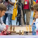 Carlsen, Karjakin Lead World Blitz Champs At Half
