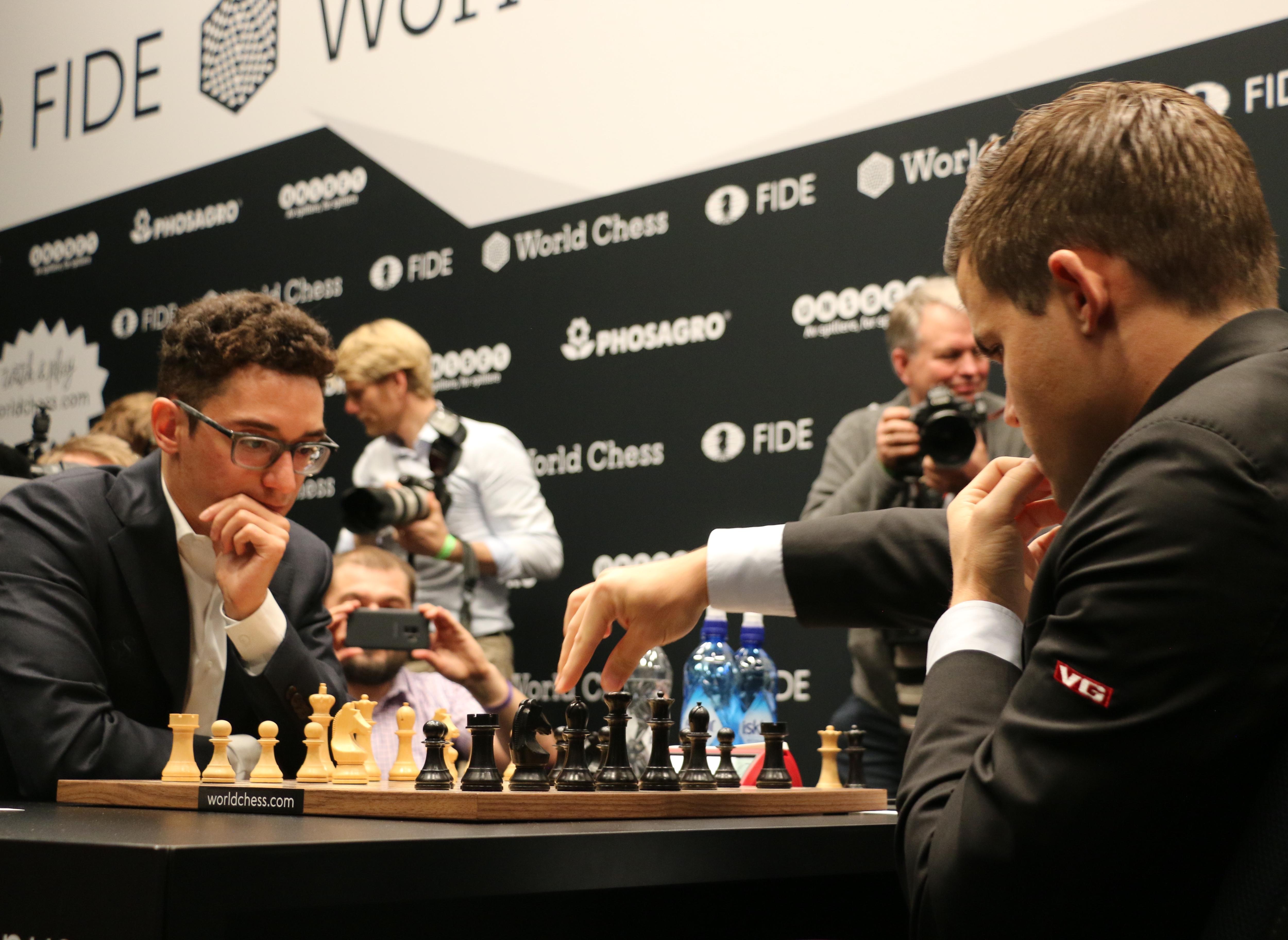 Carlsen crushes Caruana in historic fashion to advance to the
