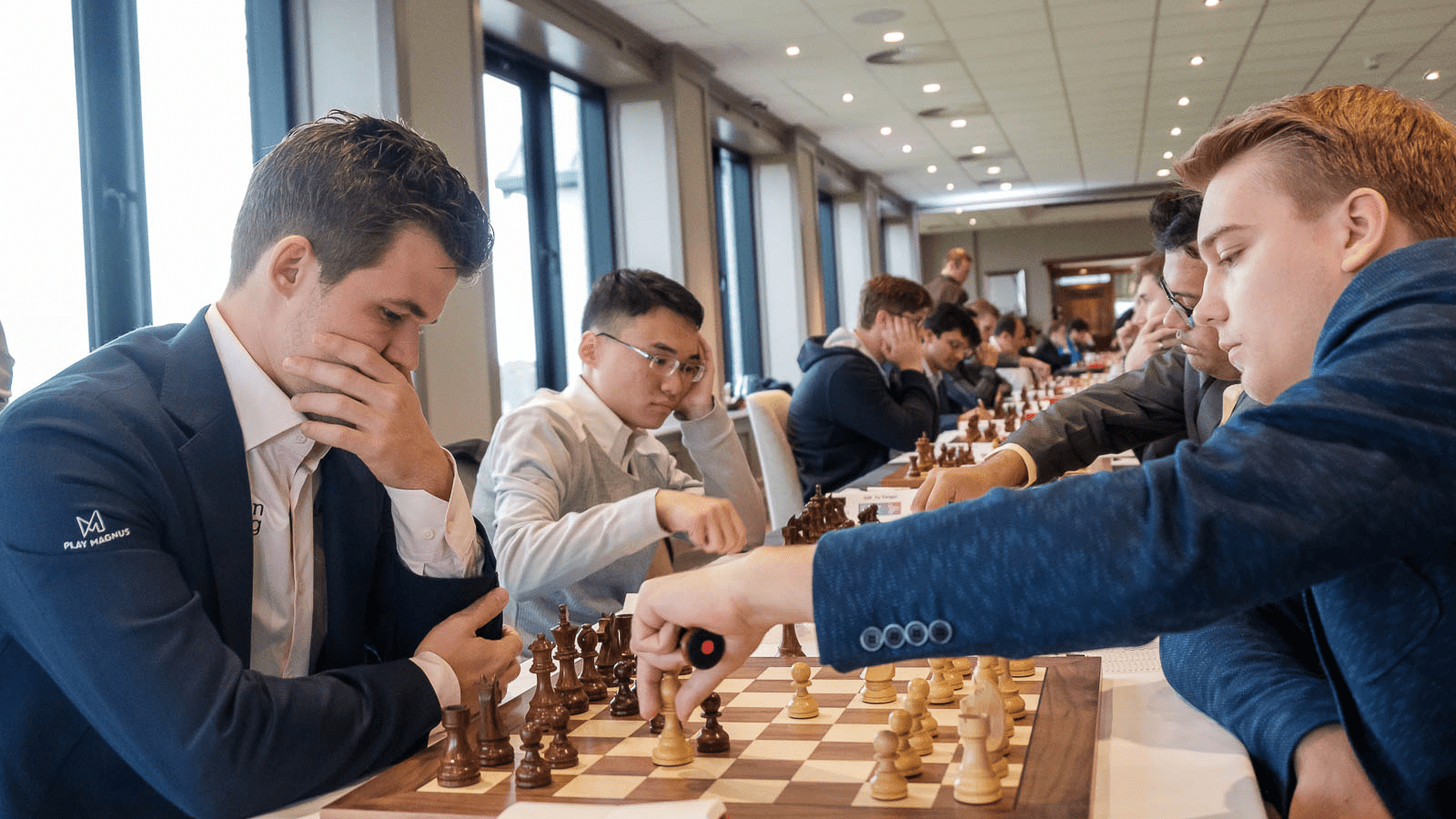 FIDE  Grand Swiss: 4 Players Lead; Carlsen Escapes 
