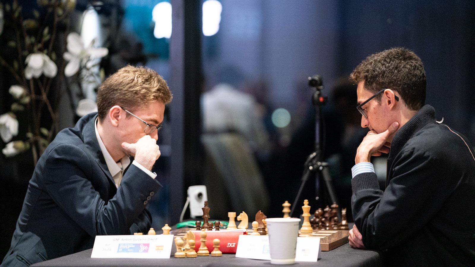 Grand Swiss 10: Caruana and Wang Hao lead